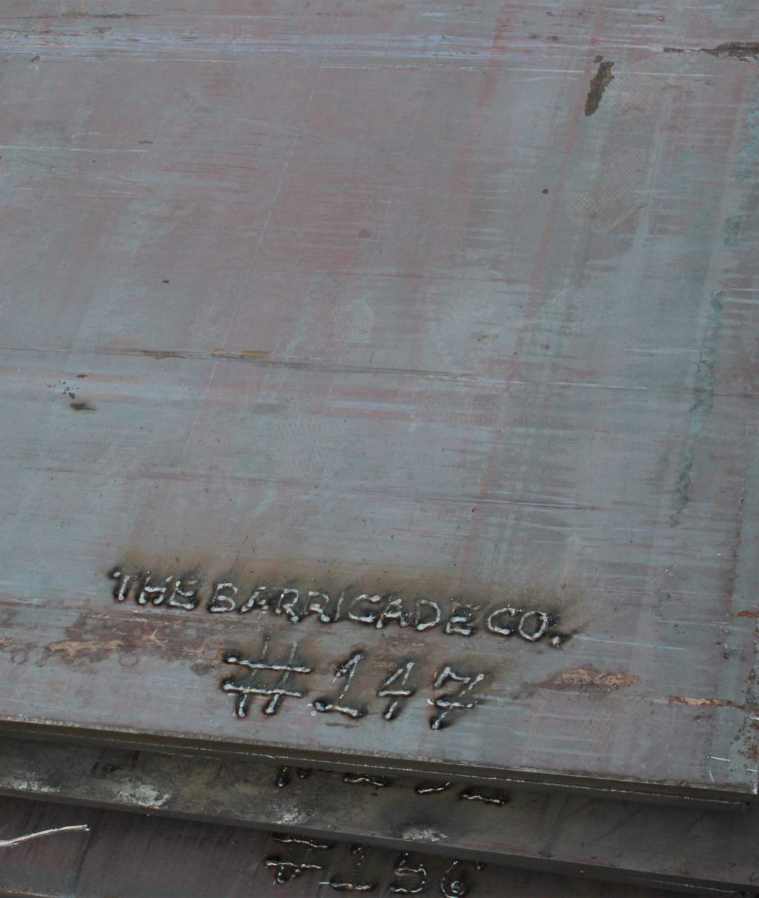 Steel trench plates serial number close up